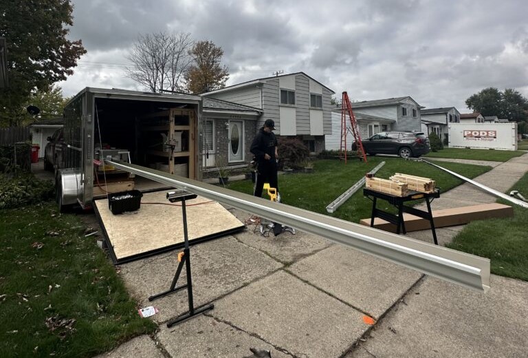 Gutter machine installing gutters