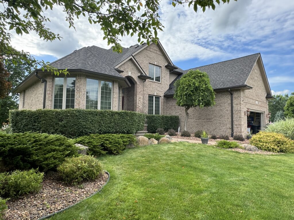 large brown brick home