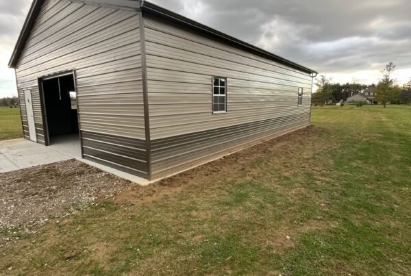 large brown garage with black gutters