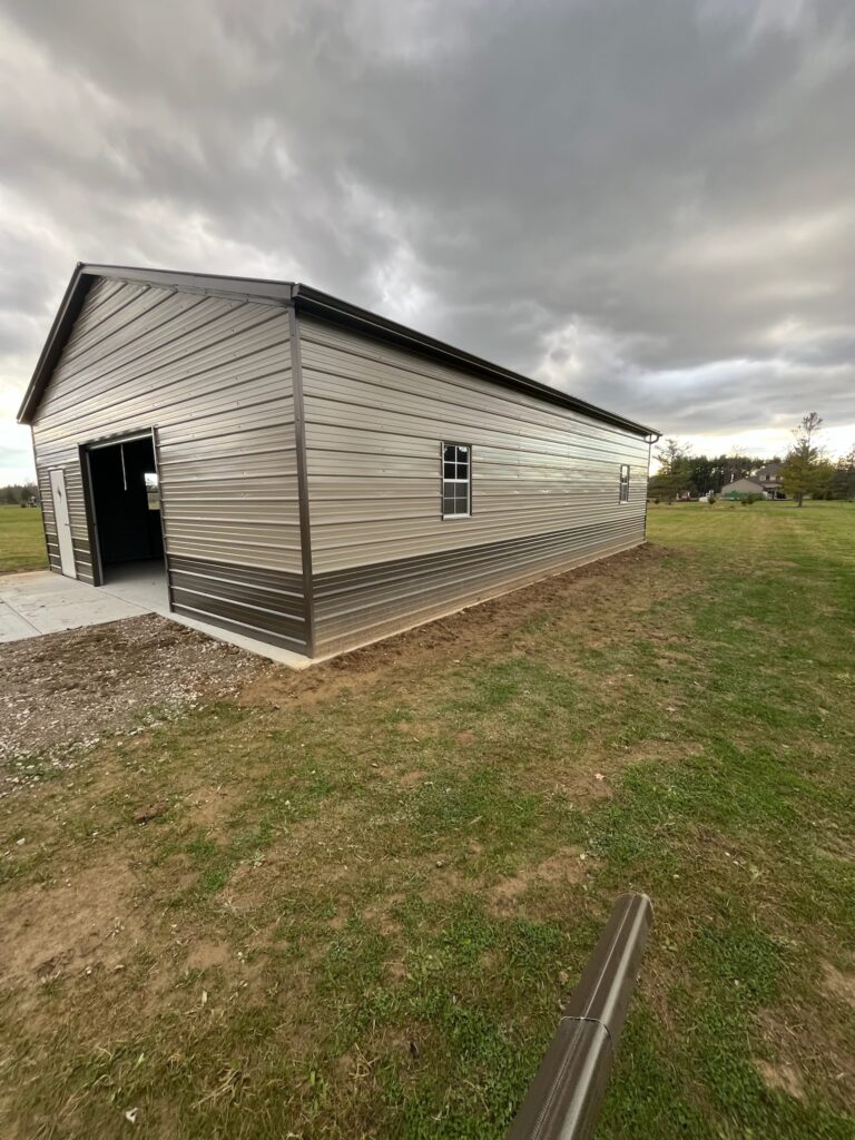 large brown garage with black gutters