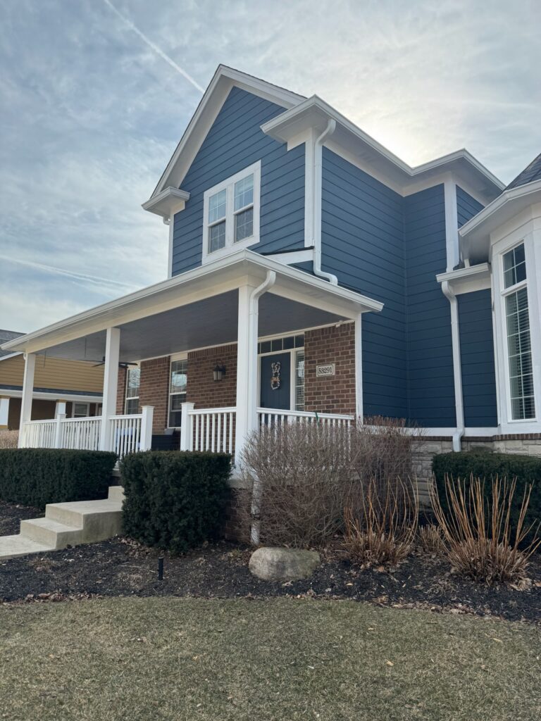 blue home with white trim