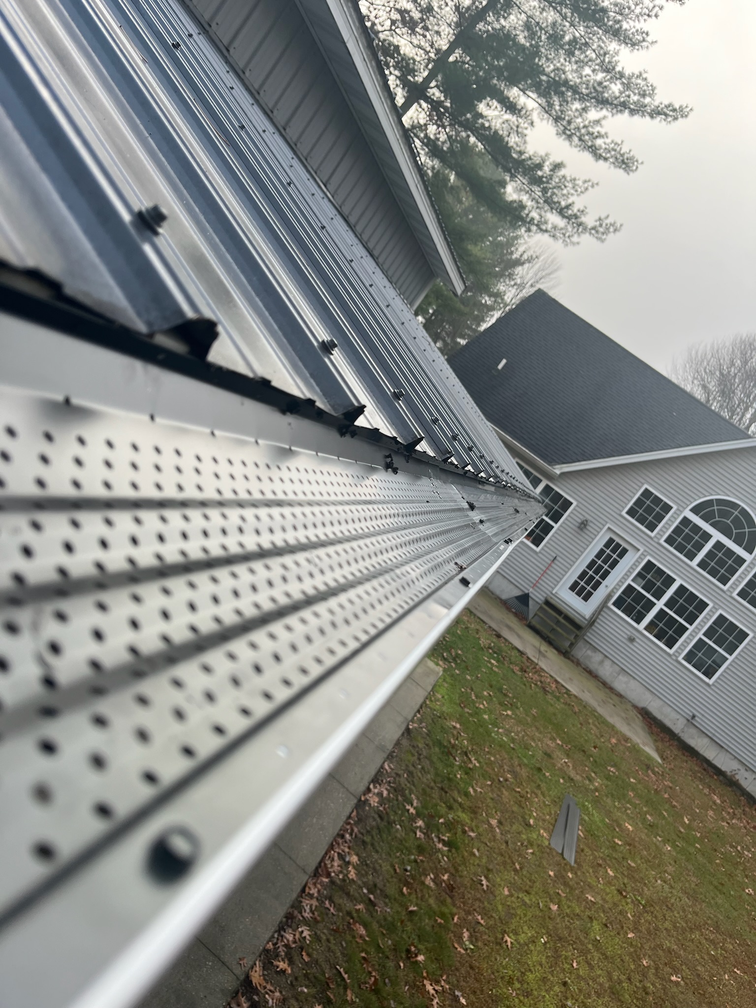 How Gutter Guards Help Prevent Water Damage