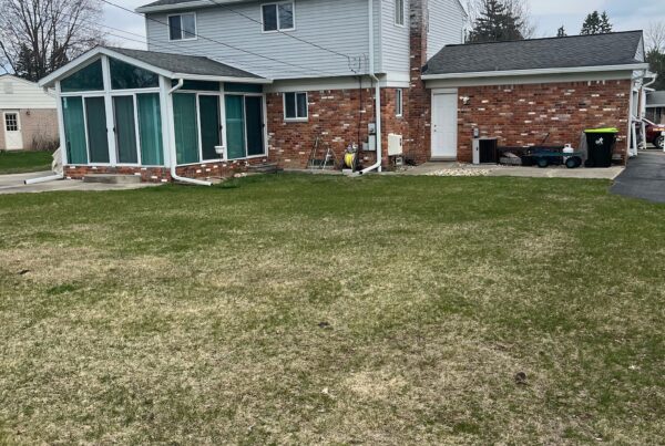 red pick two story home