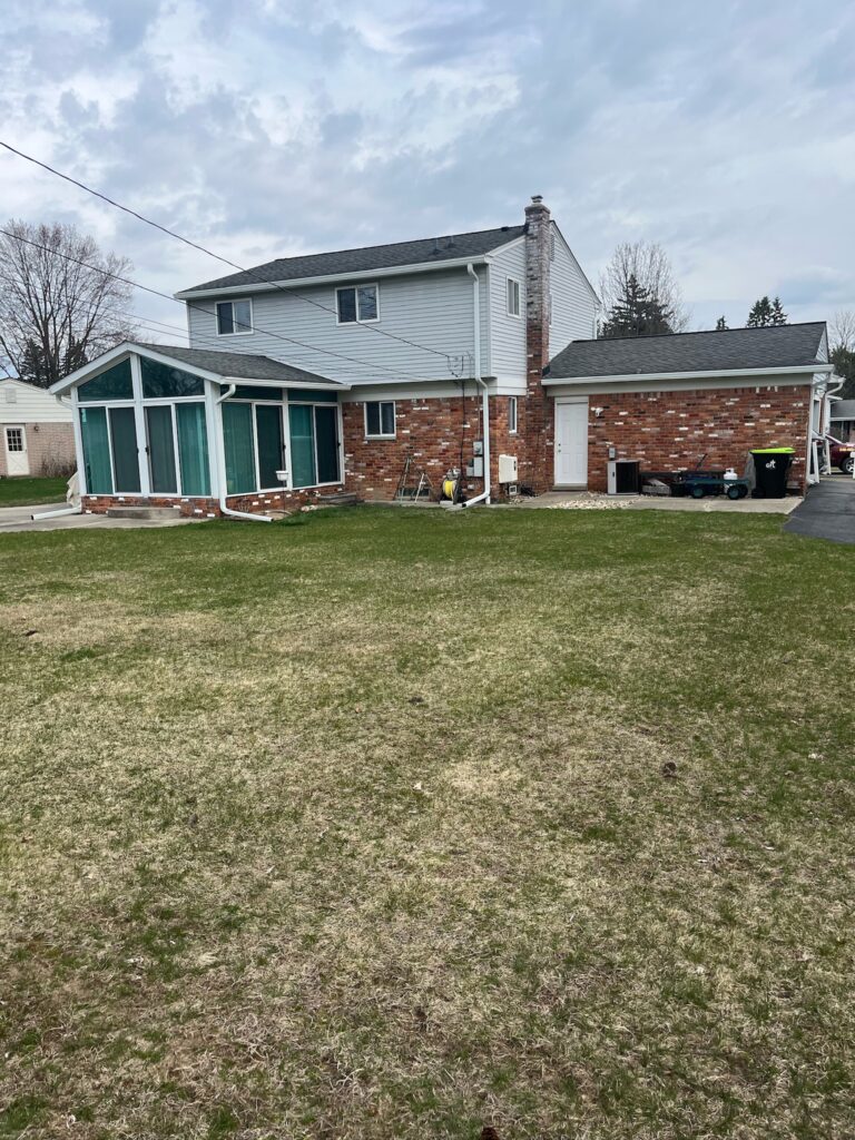 red pick two story home