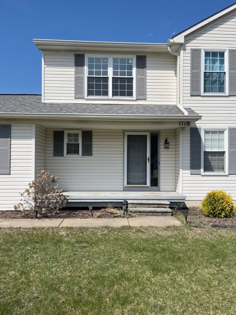 white two story home