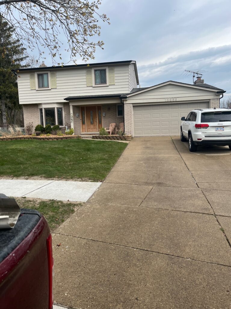 two story home with black gutters