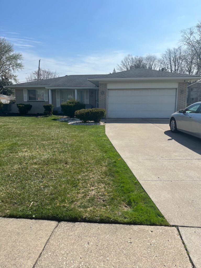 white brick one story home