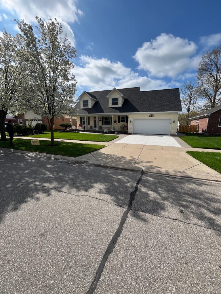 yellow sided two story home