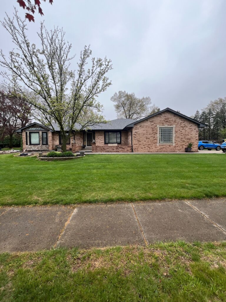 red brick one story home