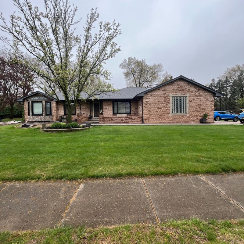 red brick one story home