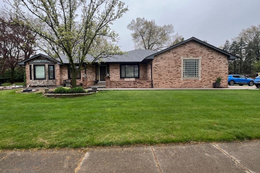 red brick one story home