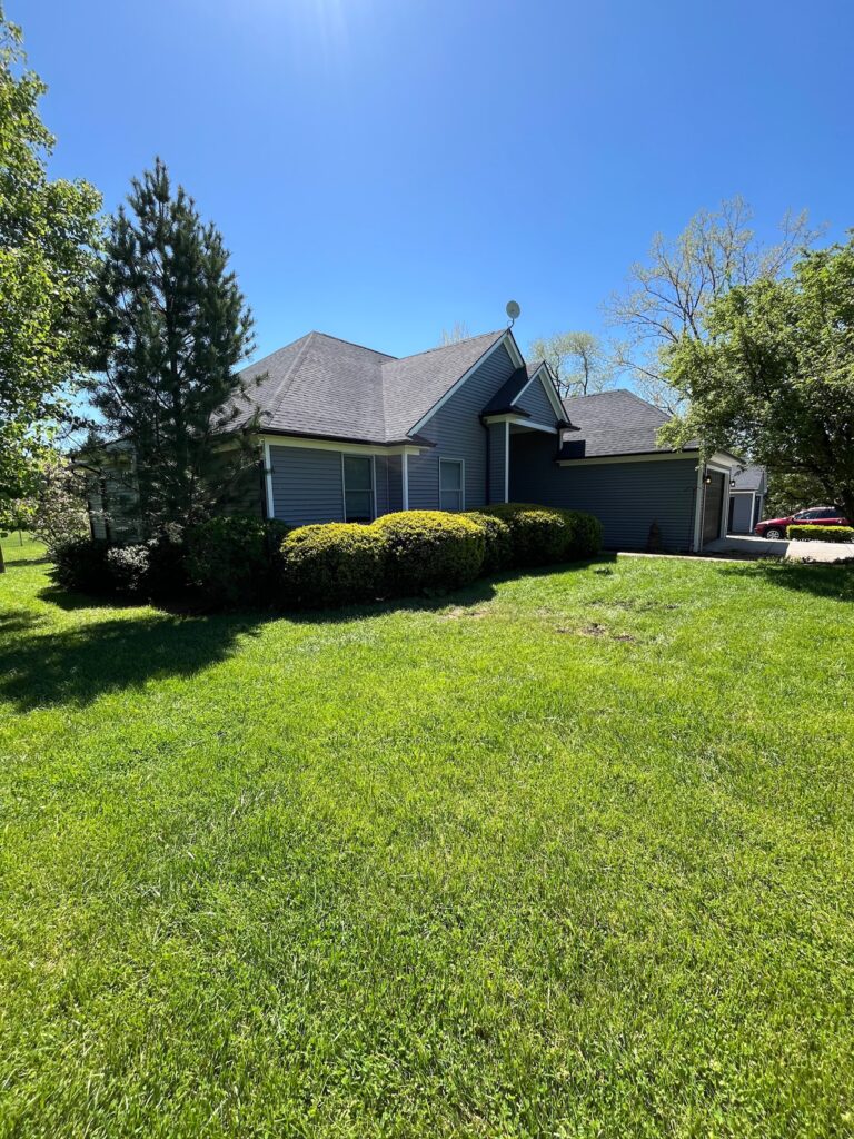 one story home with black gutters