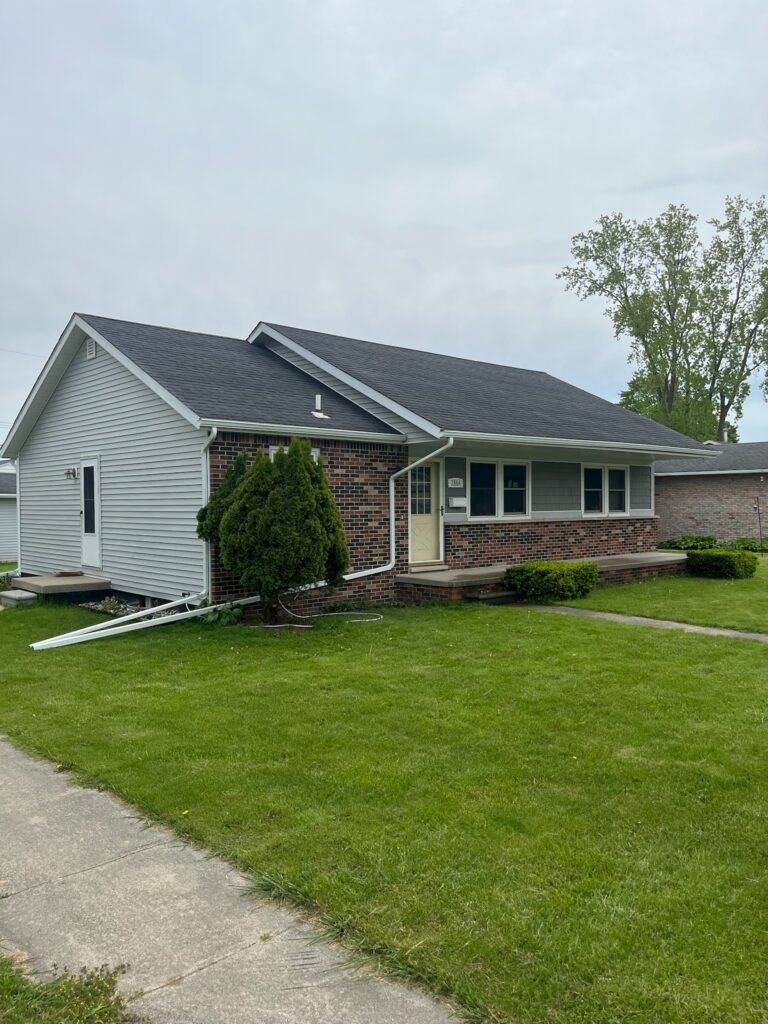 brown brick one story home