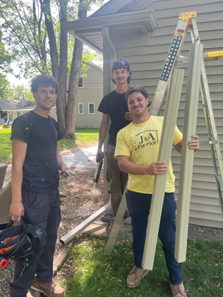 3 men with a ladder