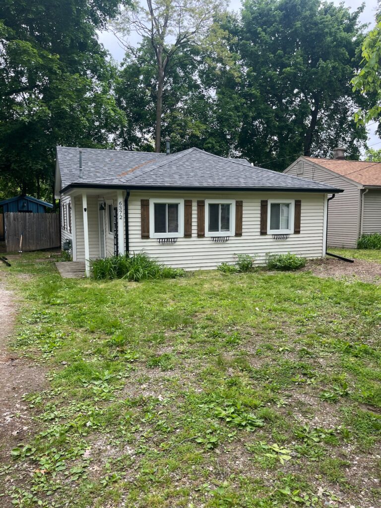 small white sided home