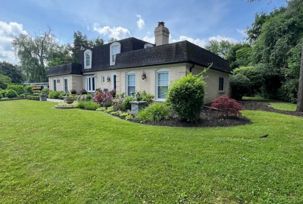 yellow two story home