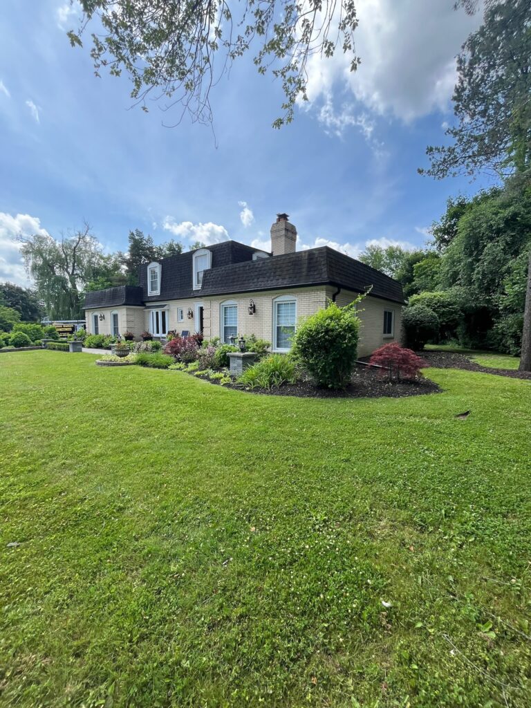 yellow two story home