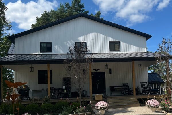 white house with black gutters